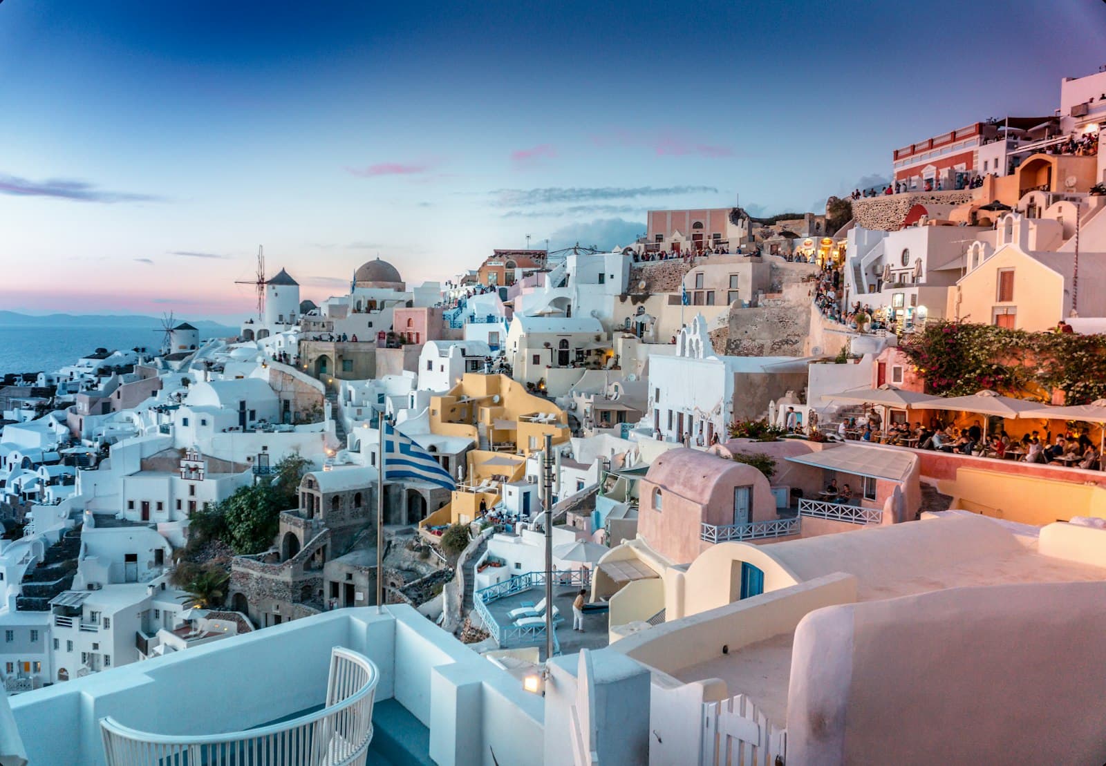 Whitewashed hillside village of Oia at dusk, Santorini, Greece